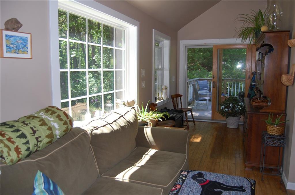 17 Old Lewiston Road Monmouth, ME 04265 - Photo 14 of 35 Living Room with sliders leading to...