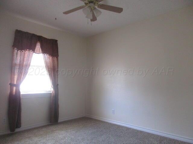 4109 South Bowie Street Amarillo, TX 79110 - Photo 7 of 13 an empty room with a window