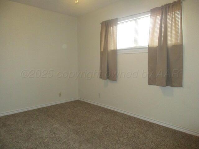 4109 South Bowie Street Amarillo, TX 79110 - Photo 8 of 13 a room that has a window in it