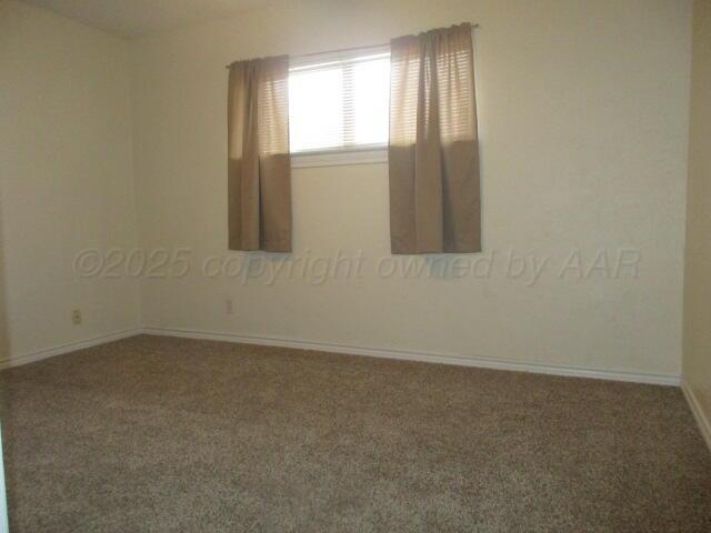 4109 South Bowie Street Amarillo, TX 79110 - Photo 9 of 13 an empty room with windows