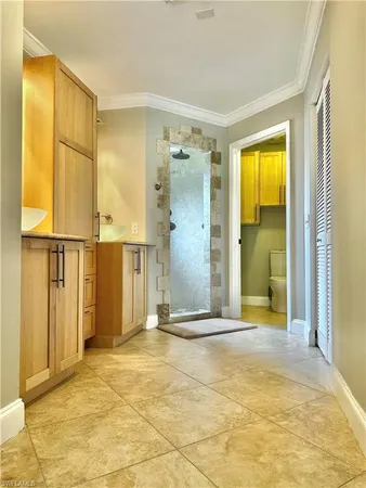 a view of a bathroom with a tub and a shower