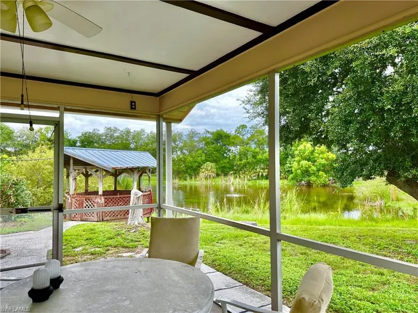 a view of a porch and garden