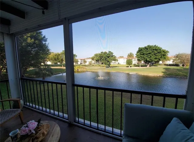 a view of a porch with furniture