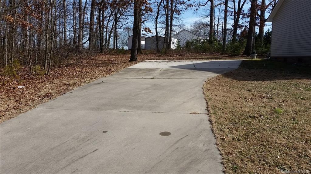 2032 Cansler Road Vale, NC 28168 - Photo 2 of 15 a view of a yard with large trees