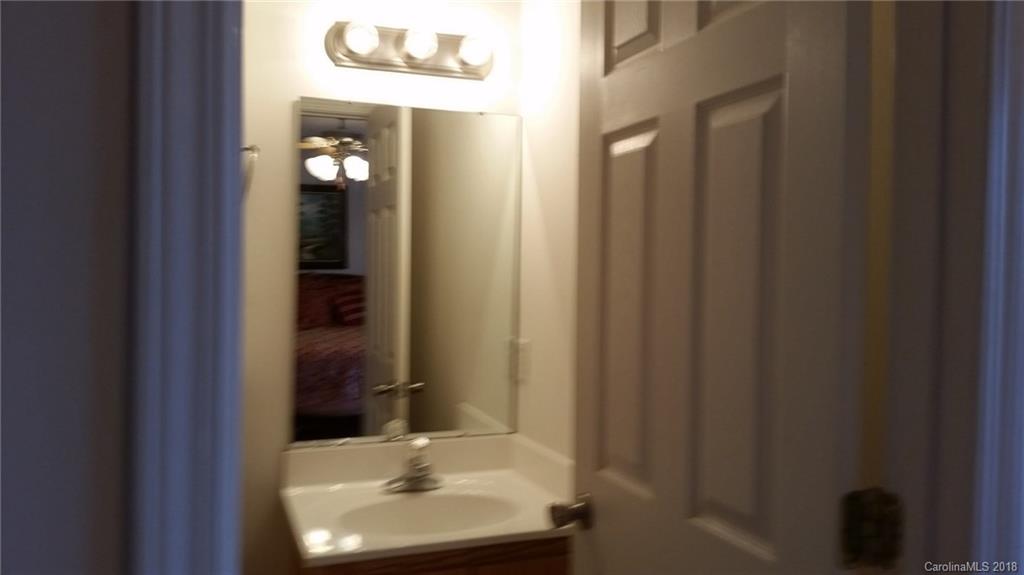 2032 Cansler Road Vale, NC 28168 - Photo 11 of 15 a bathroom with a sink and a mirror