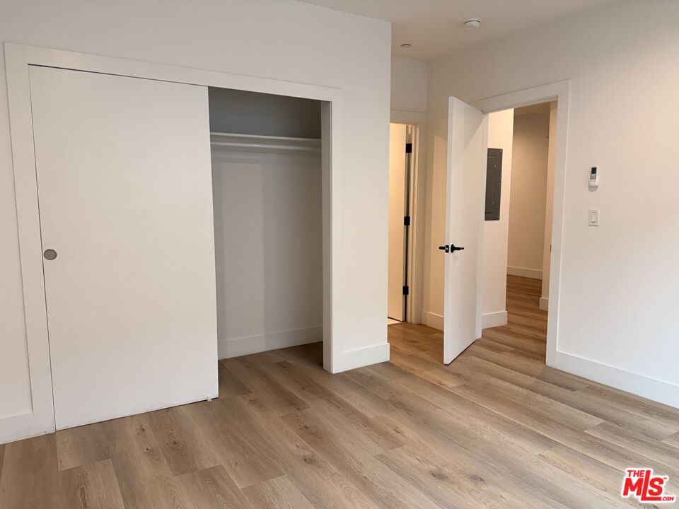 914 7th Street, Unit 9 Santa Monica, CA 90403 - Photo 7 of 9 a view of empty room with wooden floor