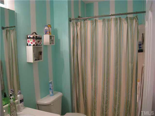 2024 Messer Road Raleigh, NC 27603 - Photo 8 of 13 Master bath is located off the bedroom.
