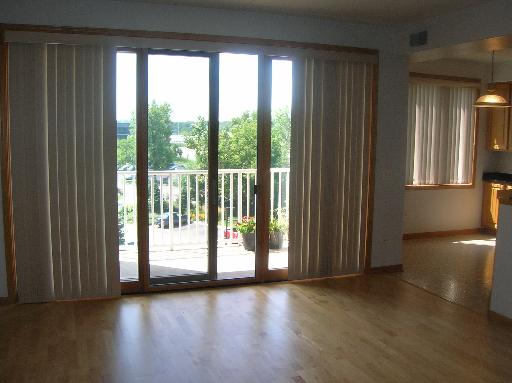 1731 Pavilion Way, Unit 408 Park Ridge, IL 60068 - Photo 7 of 16 a view of a large window with wooden floor