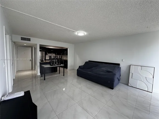 a room with furniture and window