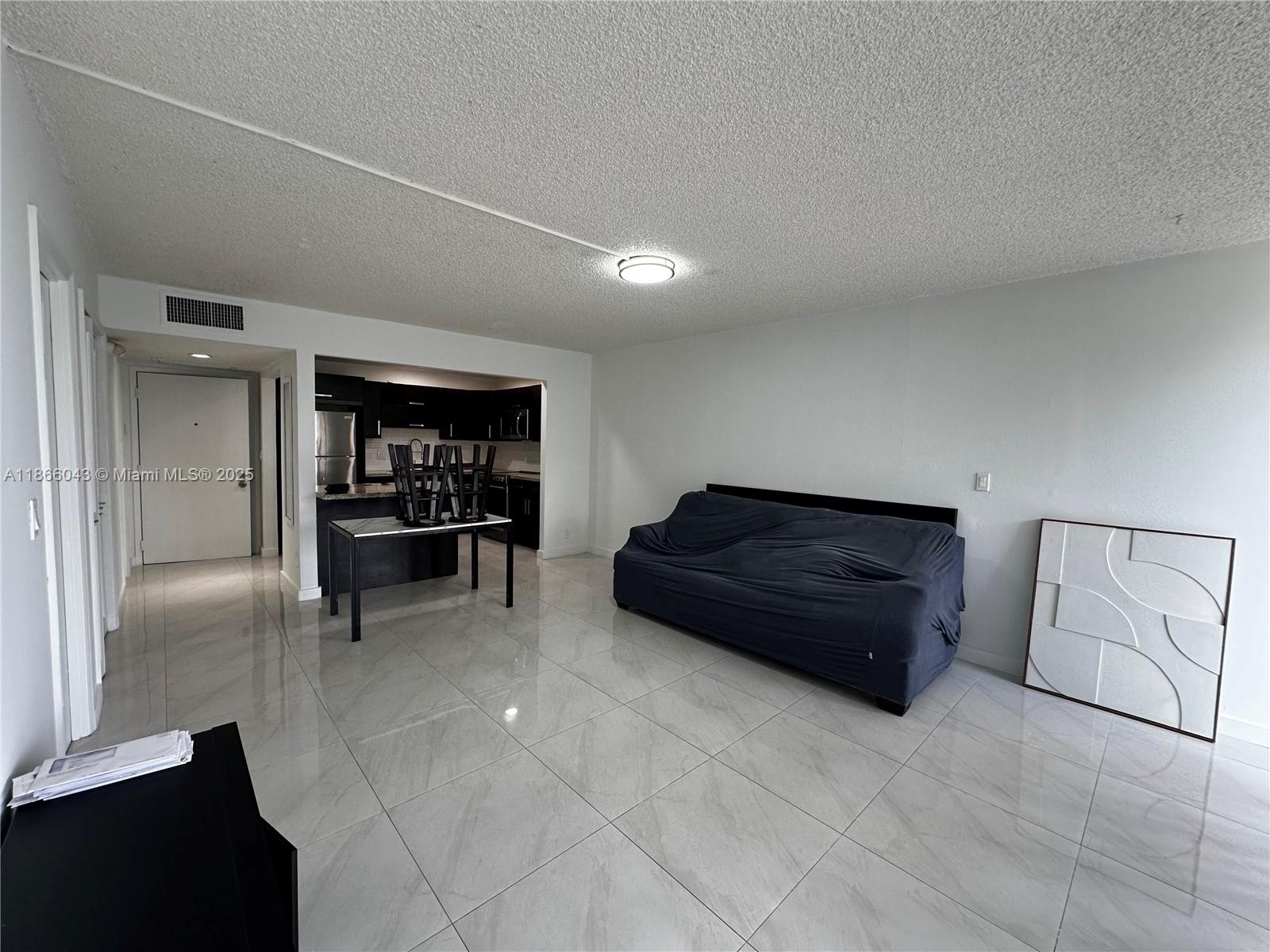 7051 Environ Boulevard, Unit 431 Lauderhill, FL 33319 - Photo 17 of 35 a room with furniture and window