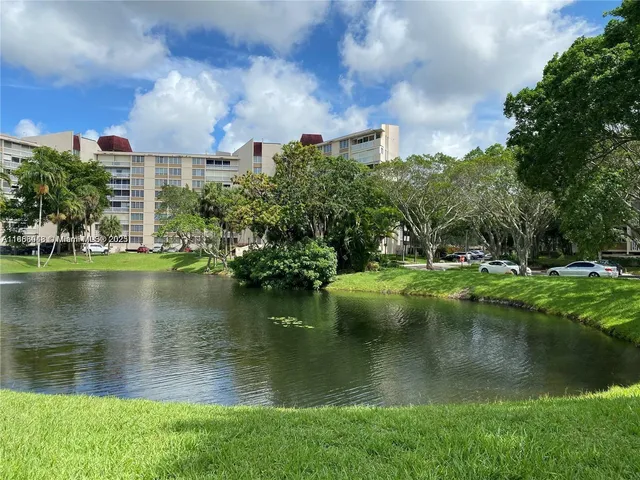 a view of a lake with a building in the background
