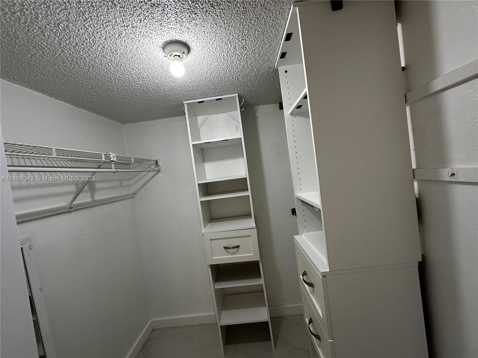 7051 Environ Boulevard, Unit 431 Lauderhill, FL 33319 - Photo 26 of 35 a view of a room with racks