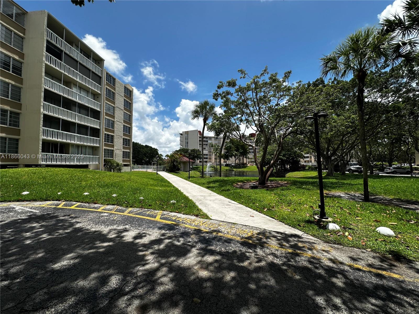 7051 Environ Boulevard, Unit 431 Lauderhill, FL 33319 - Photo 32 of 35 a view of a park with large trees