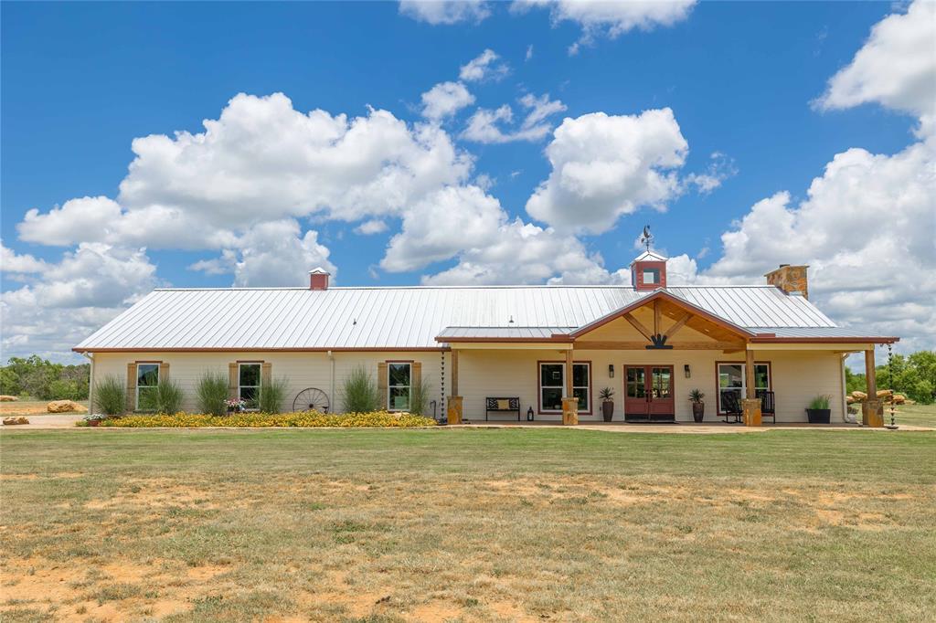 1010 Fm 583 Street West Rising Star, TX 76471 - Photo 2 of 40 a front view of a house with a yard