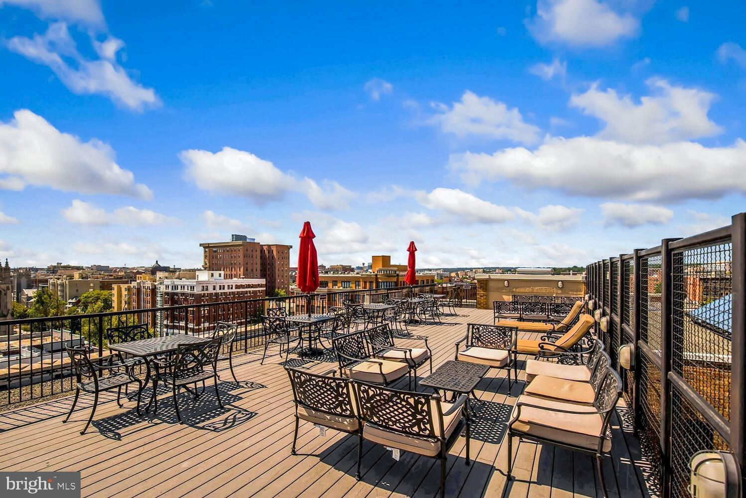 1701 16th Street Northwest, Unit 418 Washington, DC 20009 - Photo 25 of 28 Panoramic rooftop deck w/skyline views
