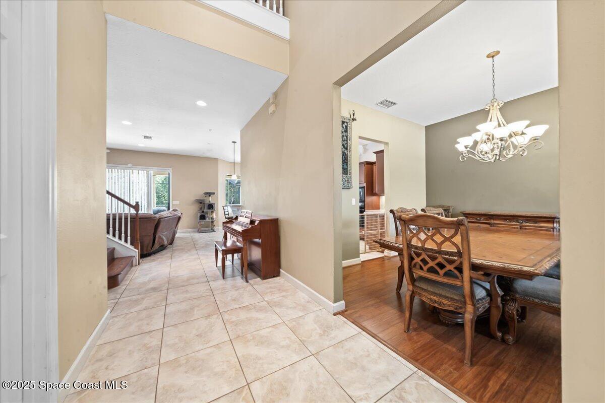 1777 Sienna Drive Melbourne, FL 32934 - Photo 13 of 31 a view of a dining room with furniture