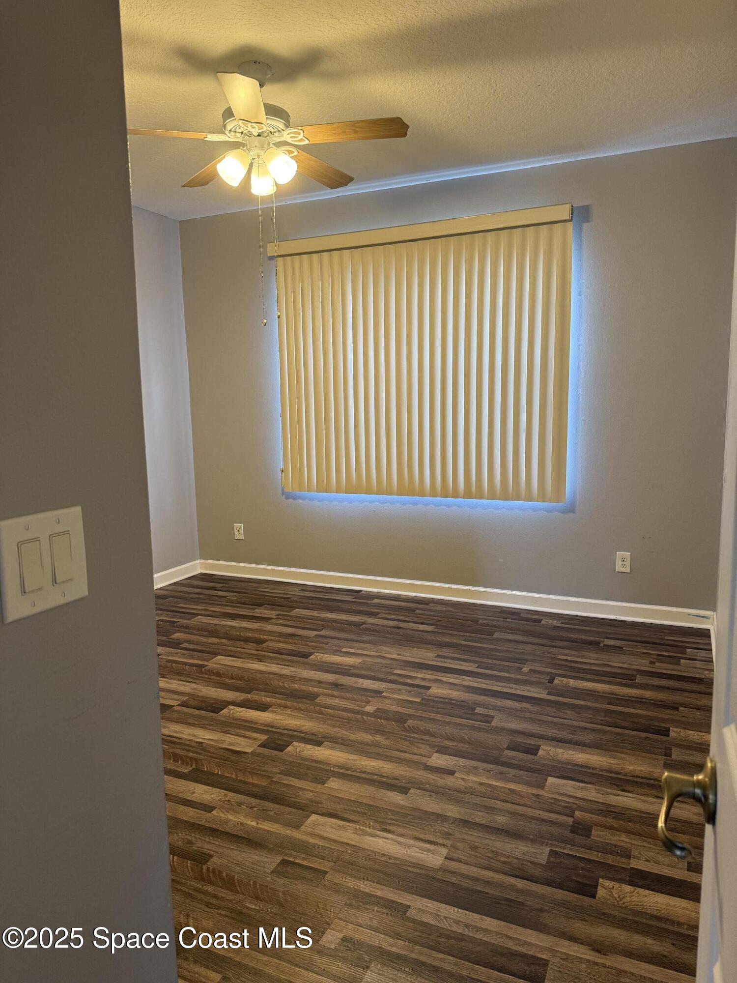 1777 Sienna Drive Melbourne, FL 32934 - Photo 23 of 31 a view of an empty room with a window