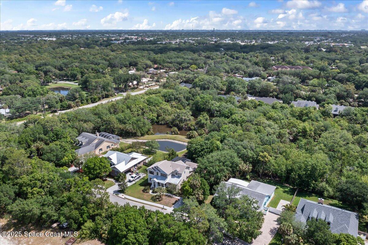 1777 Sienna Drive Melbourne, FL 32934 - Photo 27 of 31 an aerial view of a house with a yard