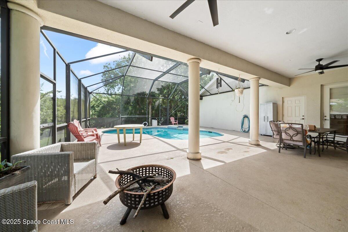 1777 Sienna Drive Melbourne, FL 32934 - Photo 5 of 31 a outdoor space with patio the couch and chairs