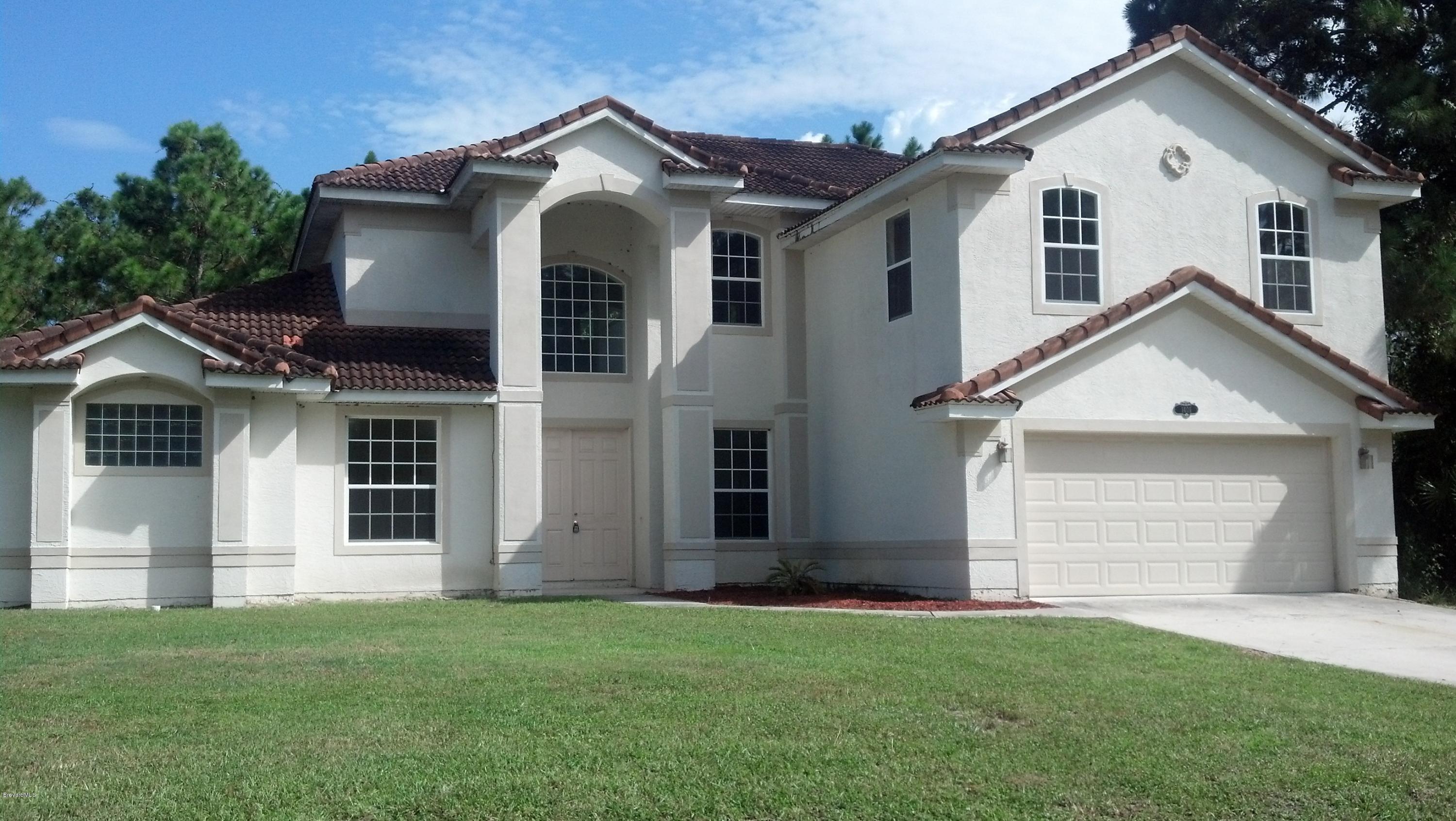 1401 Hanscom Road Southwest Palm Bay, FL 32908 - Photo 1 of 12 HANSCOM FRONT