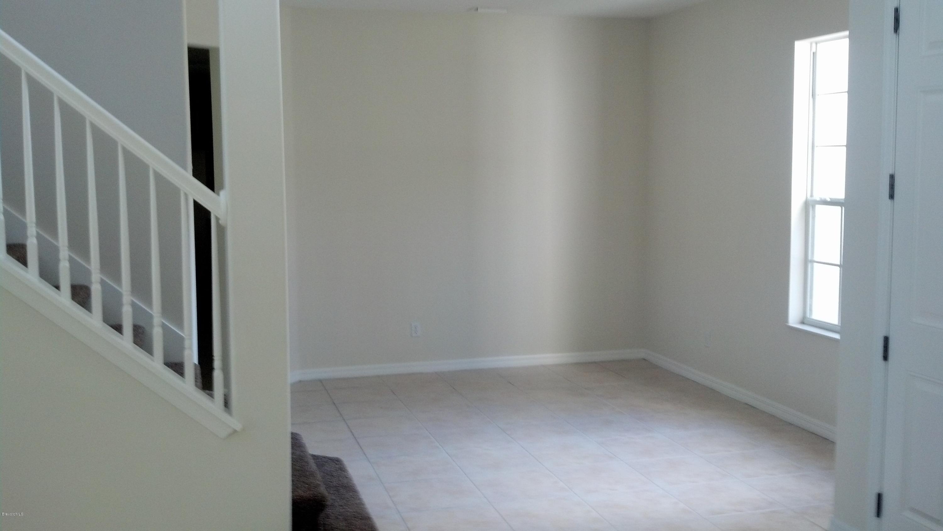 1401 Hanscom Road Southwest Palm Bay, FL 32908 - Photo 11 of 12 HANSCOM DINING ROOM