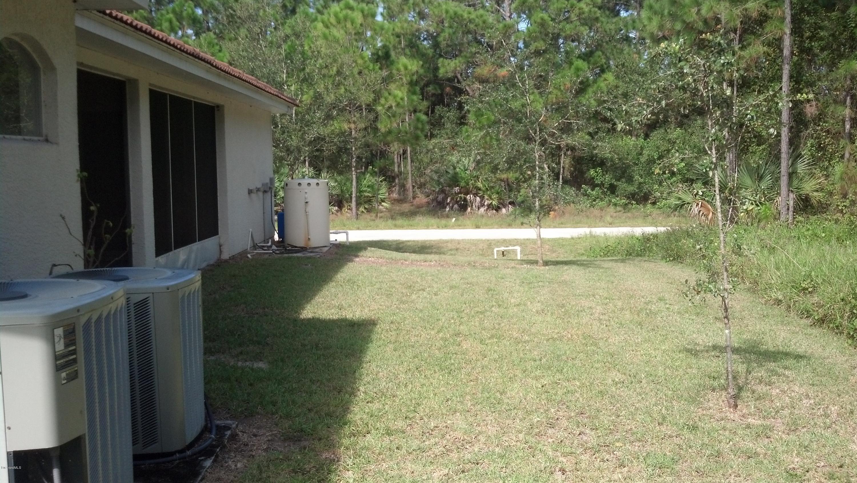 1401 Hanscom Road Southwest Palm Bay, FL 32908 - Photo 3 of 12 HANSCOM BACKYARD