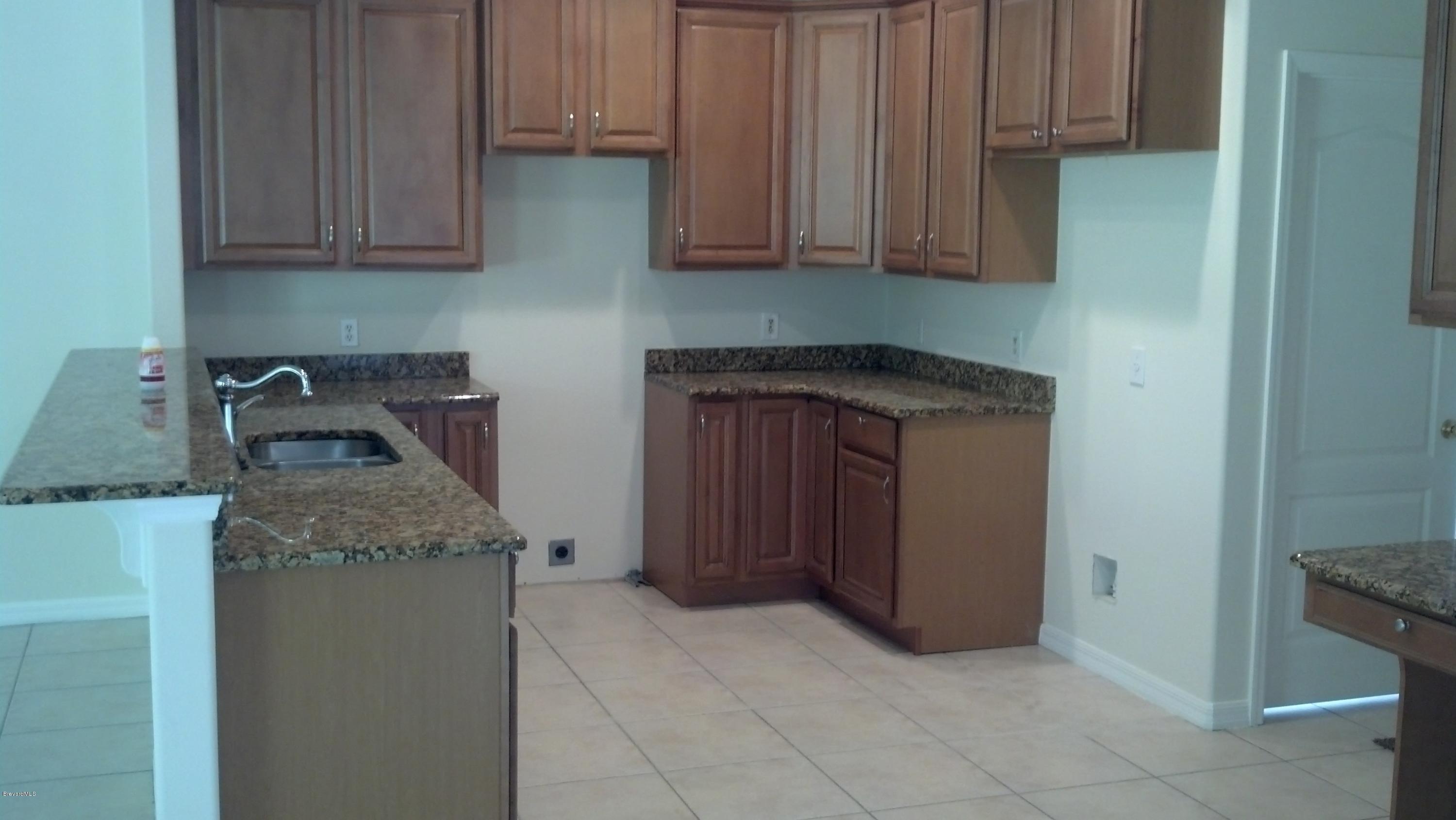 1401 Hanscom Road Southwest Palm Bay, FL 32908 - Photo 4 of 12 HANSCOM KITCHEN