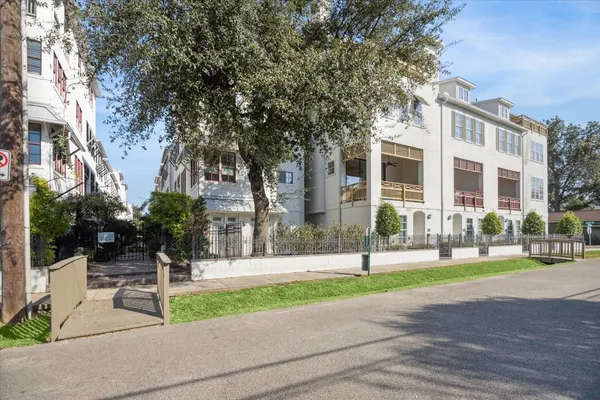 a view of a building with a bench in front of it