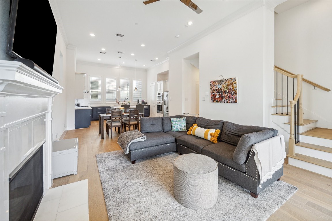 2714 Harvard Street Houston, TX 77008 - Photo 4 of 32 a living room with fireplace furniture and a flat screen tv