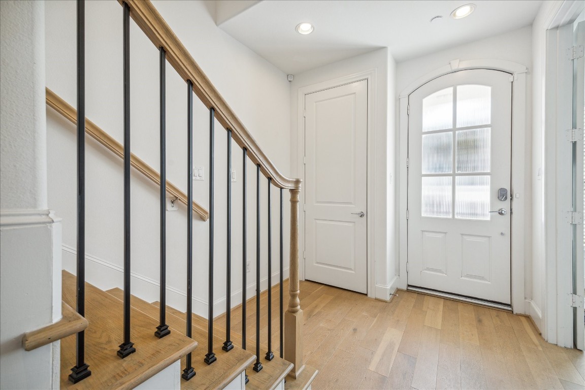 2714 Harvard Street Houston, TX 77008 - Photo 10 of 32 a view of an entryway with wooden floor and door