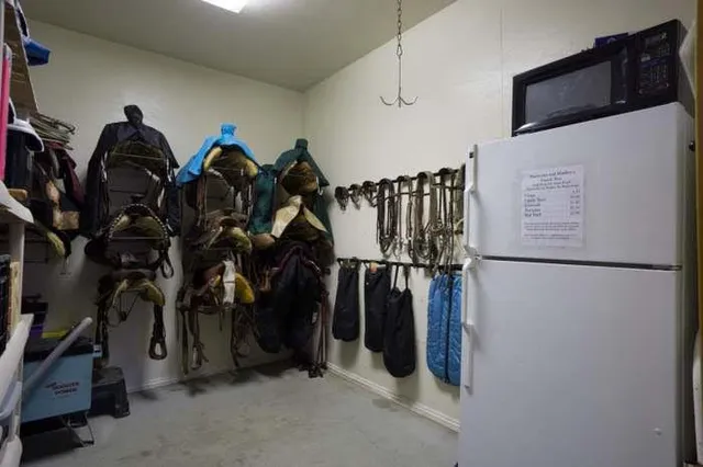 a living room with fireplace furniture and a flat screen tv