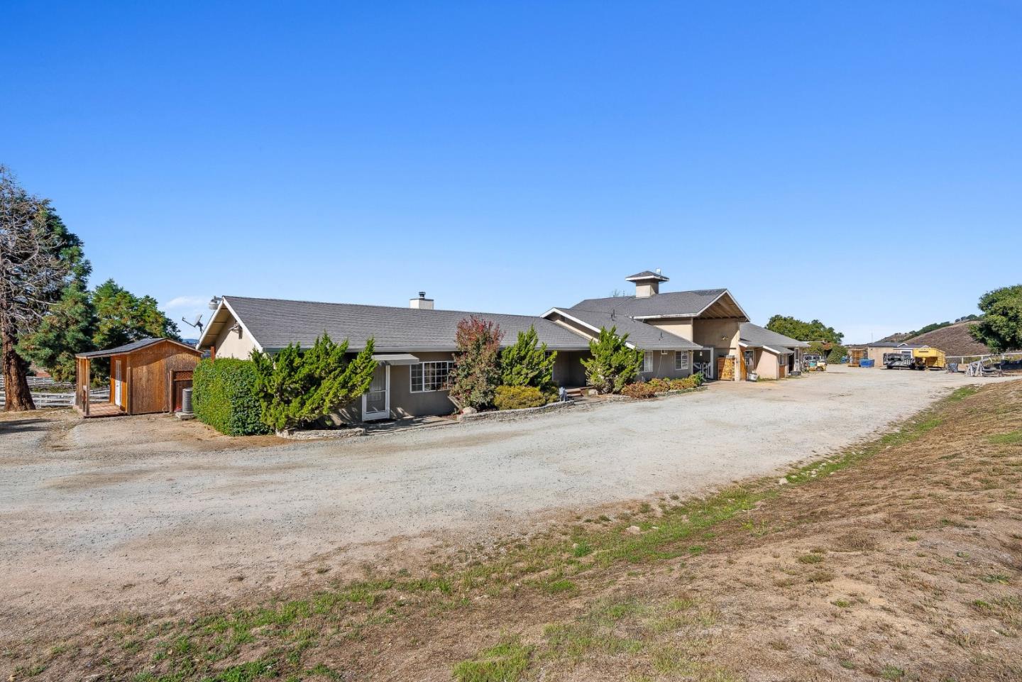 350 San Benancio Road Salinas, CA 93908 - Photo 41 of 68 a front view of a house with a yard and potted plants