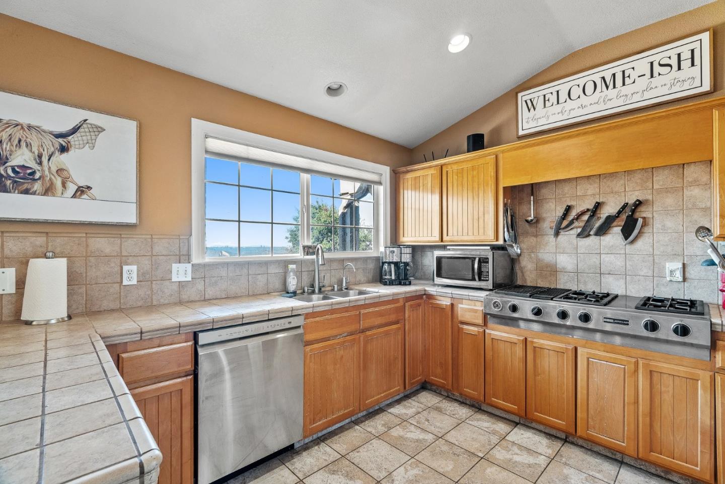 350 San Benancio Road Salinas, CA 93908 - Photo 45 of 68 a kitchen with stainless steel appliances a sink a stove and cabinets
