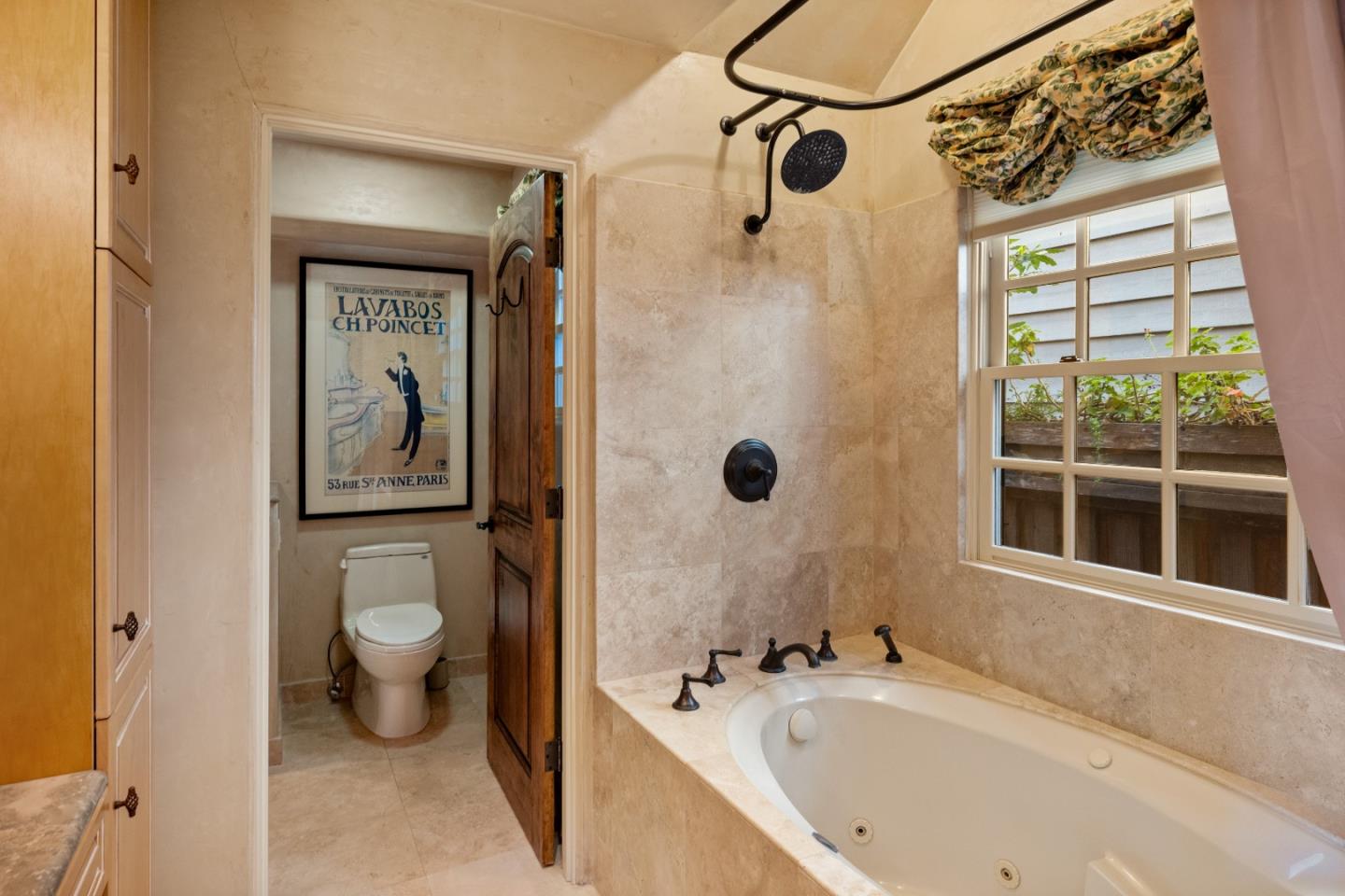 3 Santa Fe Street Carmel, CA 93923 - Photo 43 of 72 a bathroom with a tub a window and a shower