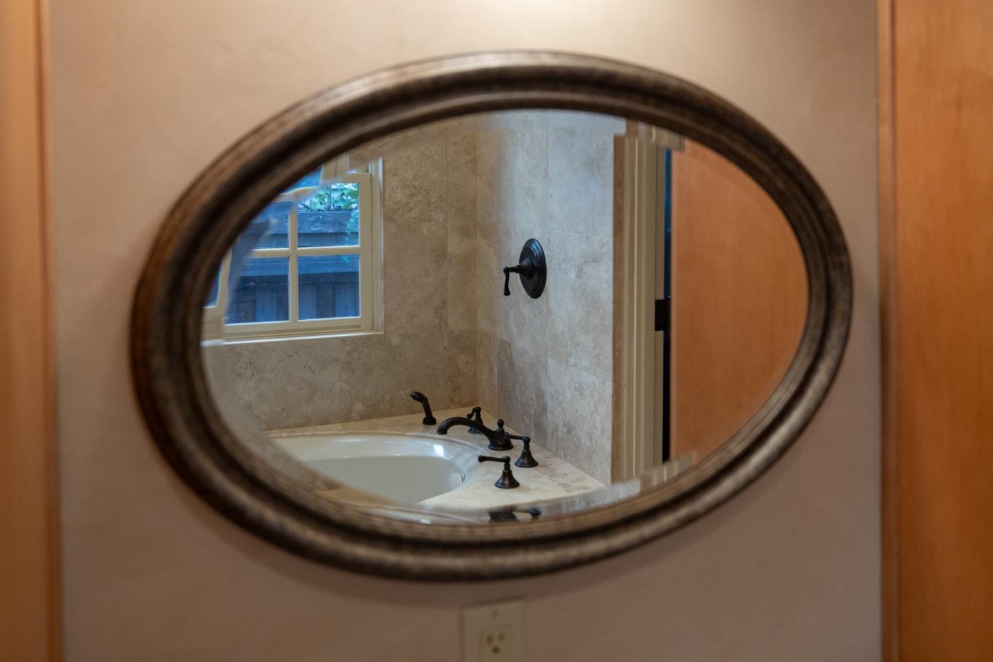 3 Santa Fe Street Carmel, CA 93923 - Photo 46 of 72 a picture of a mirror gate