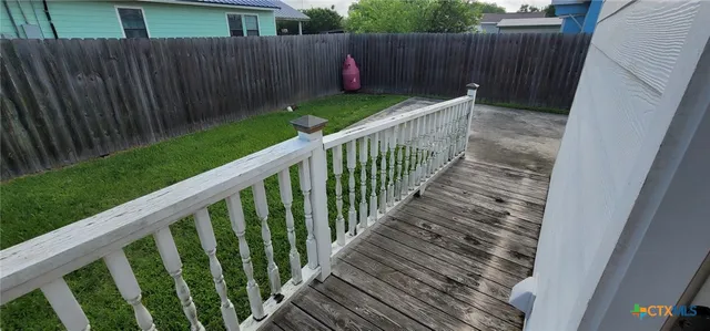 a view of a wooden fence