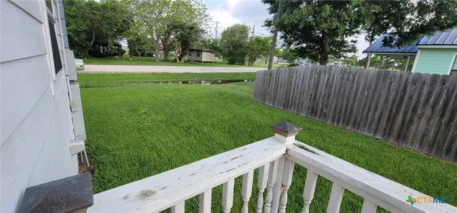 a view of a backyard with a garden