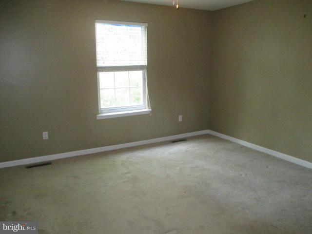 743 Lazy River Road Lusby, MD 20657 - Photo 7 of 16 an empty room with a window