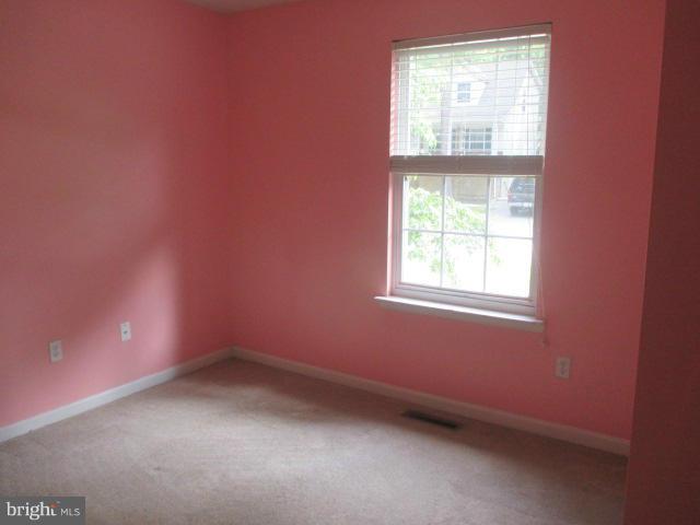 743 Lazy River Road Lusby, MD 20657 - Photo 8 of 16 an empty room with a window