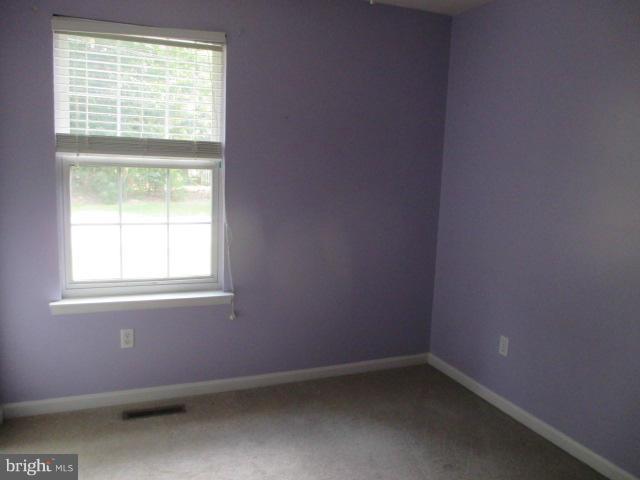 743 Lazy River Road Lusby, MD 20657 - Photo 9 of 16 an empty room with a window