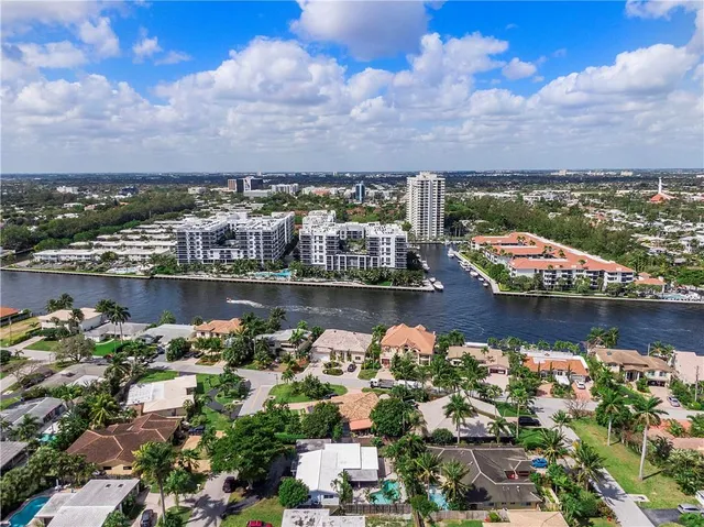 aerial view of a city with lake view