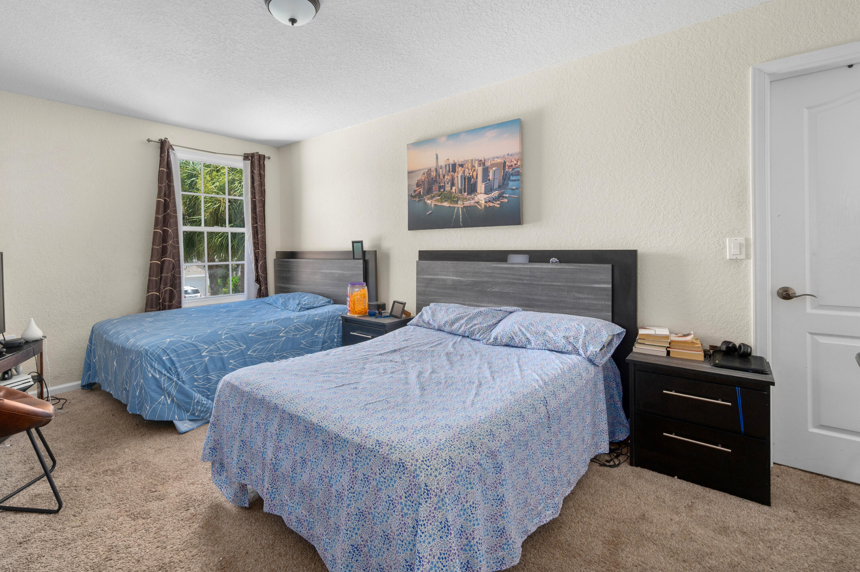 311 Berenger Walk Royal Palm Beach, FL 33414 - Photo 18 of 34 a bedroom with bed and a window