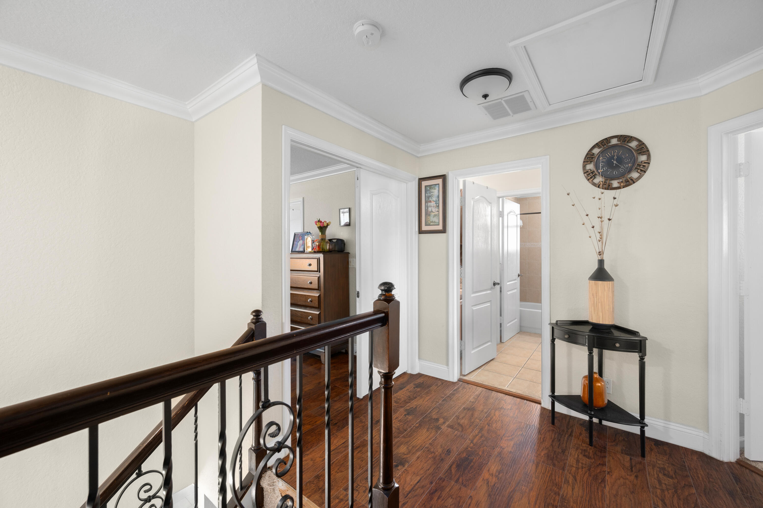 311 Berenger Walk Royal Palm Beach, FL 33414 - Photo 22 of 34 a view of a hallway with wooden floor and stairs