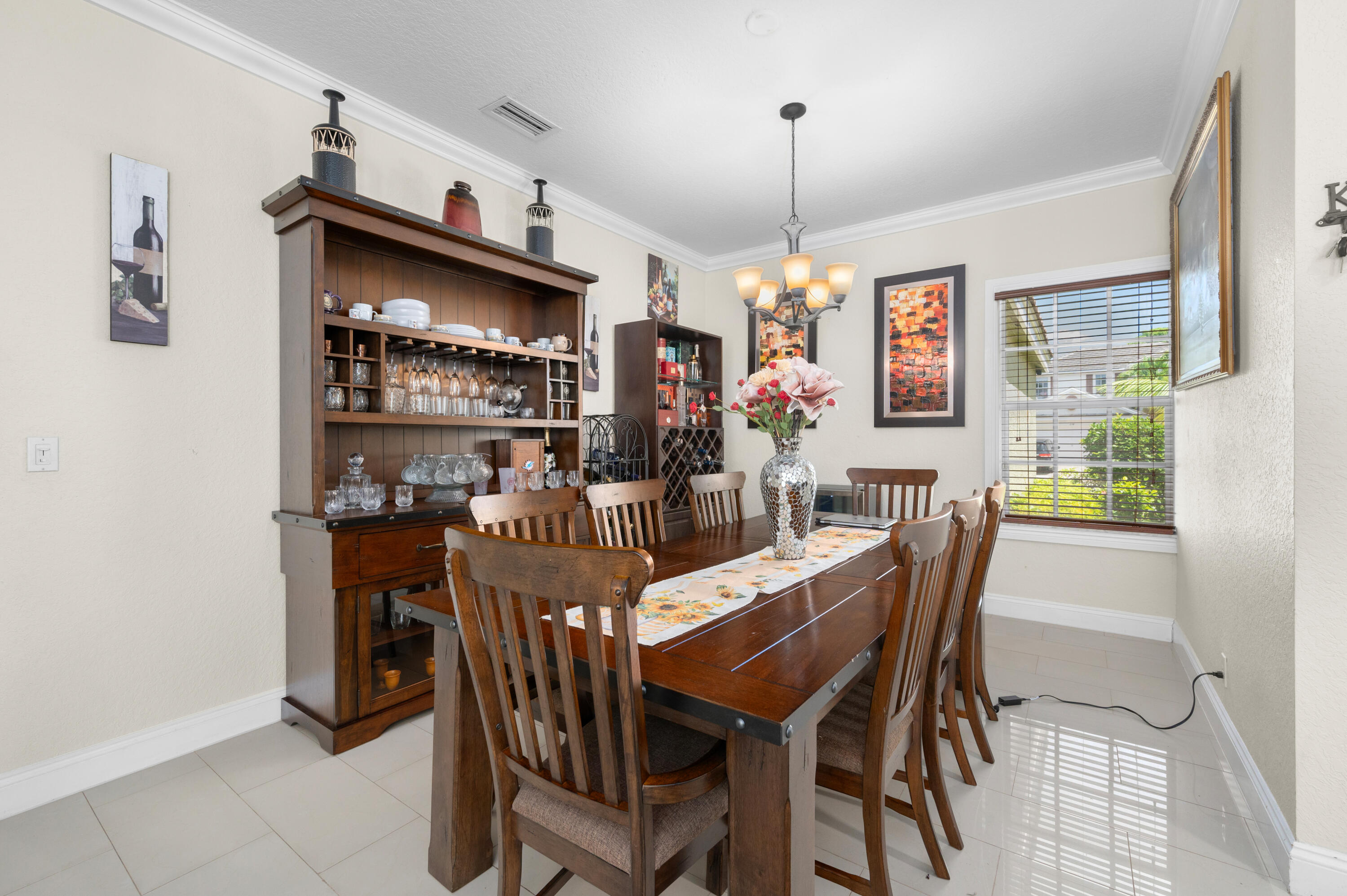 311 Berenger Walk Royal Palm Beach, FL 33414 - Photo 3 of 34 a view of a dining room with furniture window and outside view