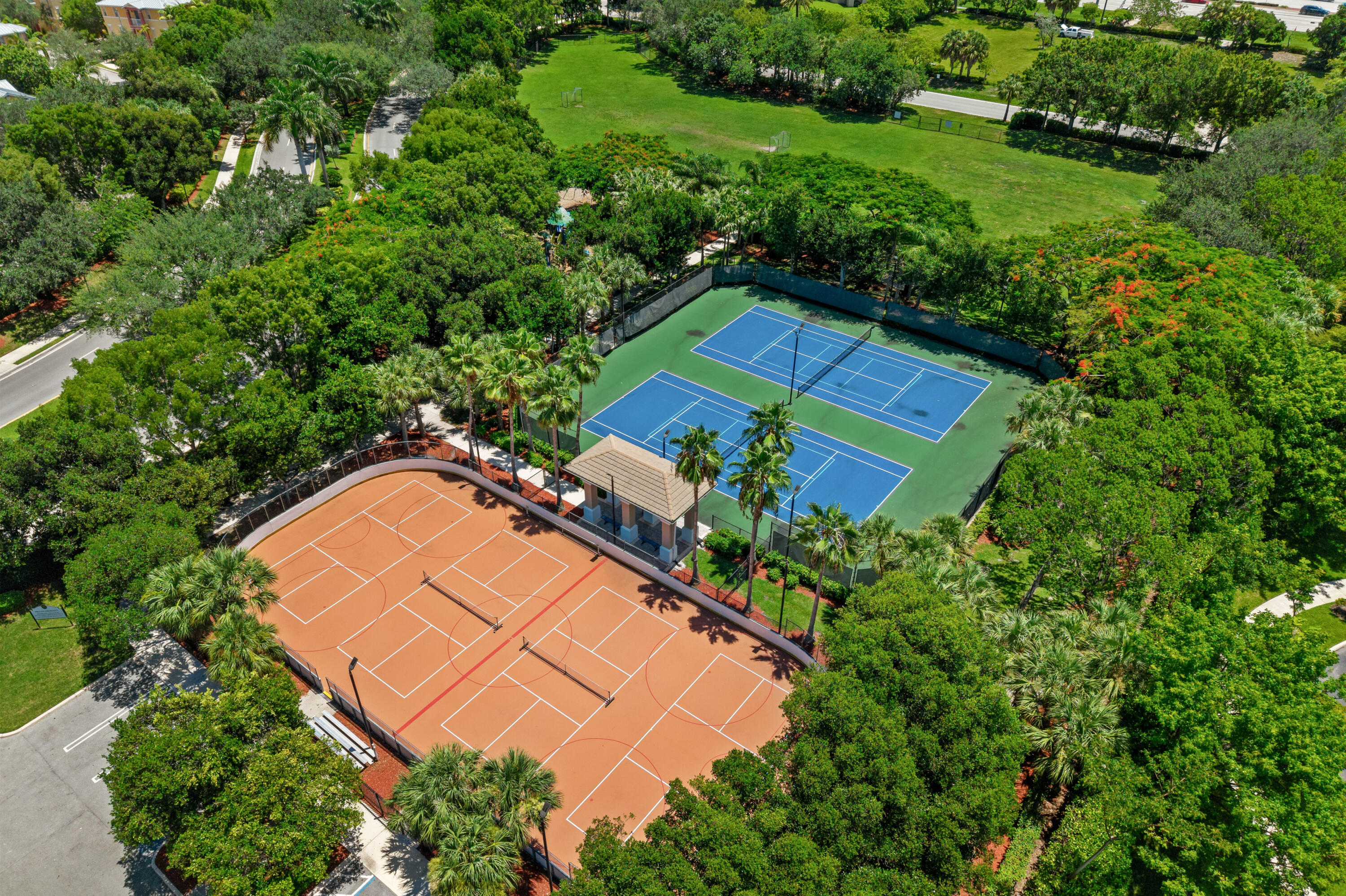 311 Berenger Walk Royal Palm Beach, FL 33414 - Photo 34 of 34 an aerial view of a house a yard and swimming pool