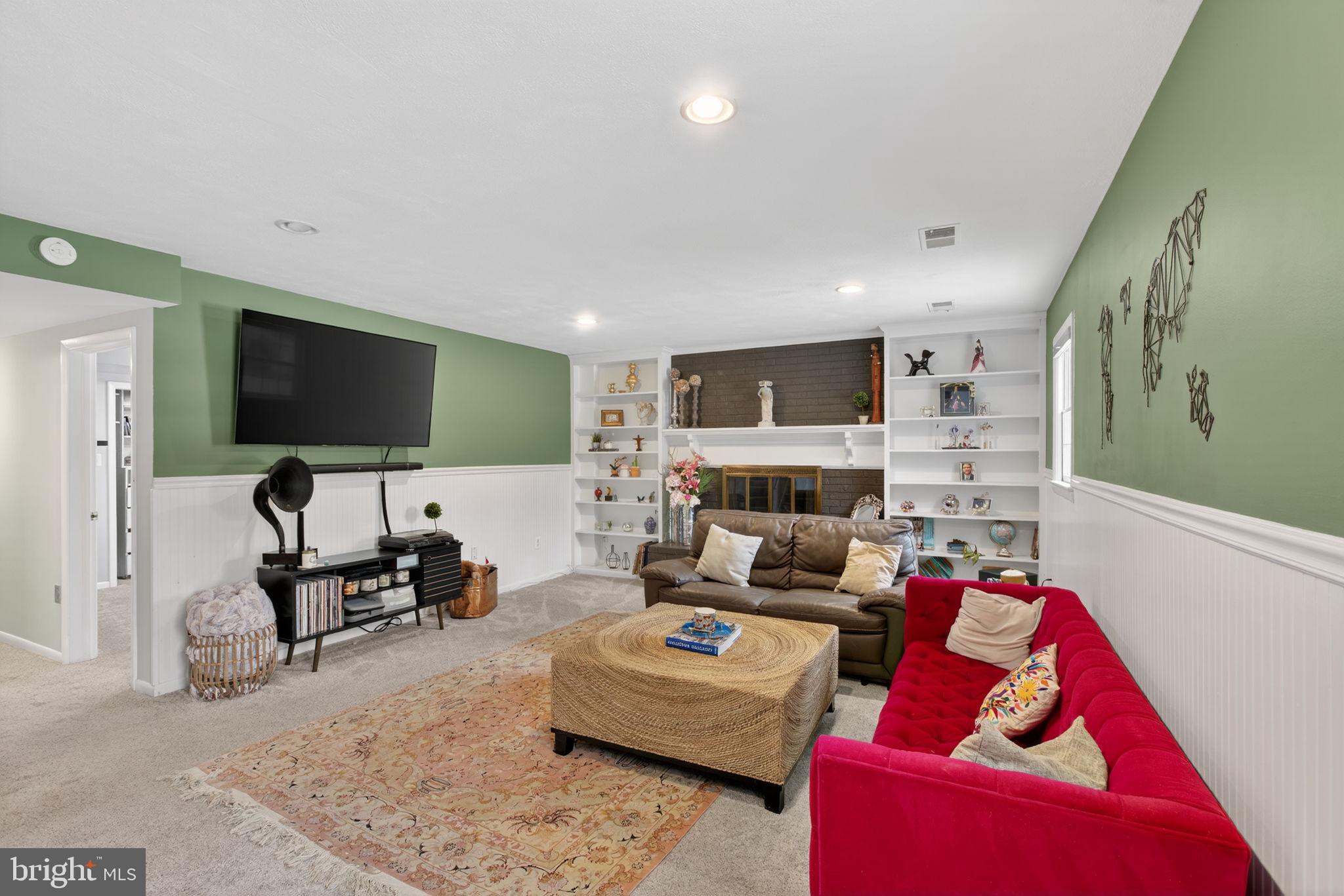 2849 Hideaway Road Fairfax, VA 22031 - Photo 13 of 45 a living room with furniture and a flat screen tv