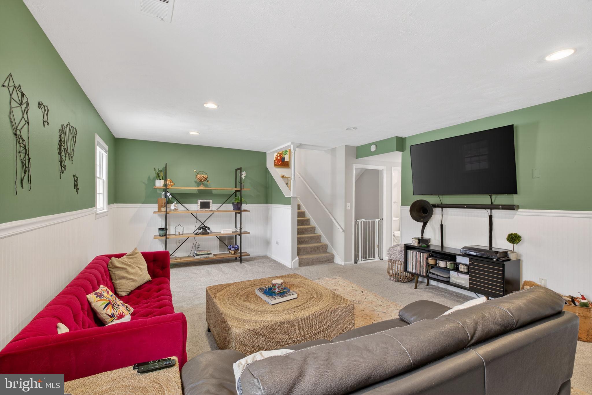 2849 Hideaway Road Fairfax, VA 22031 - Photo 14 of 45 a living room with furniture and a flat screen tv