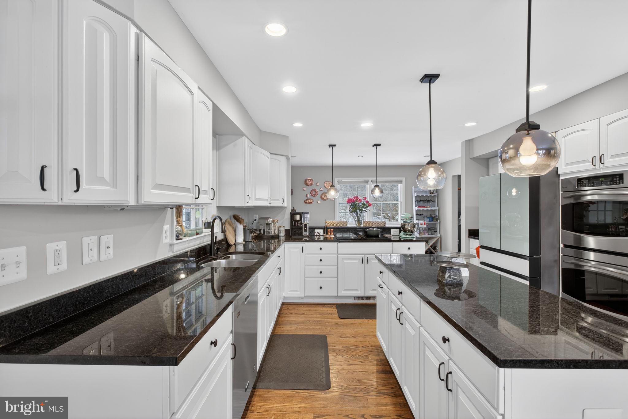 2849 Hideaway Road Fairfax, VA 22031 - Photo 6 of 45 a large kitchen with granite countertop lots of counter top space