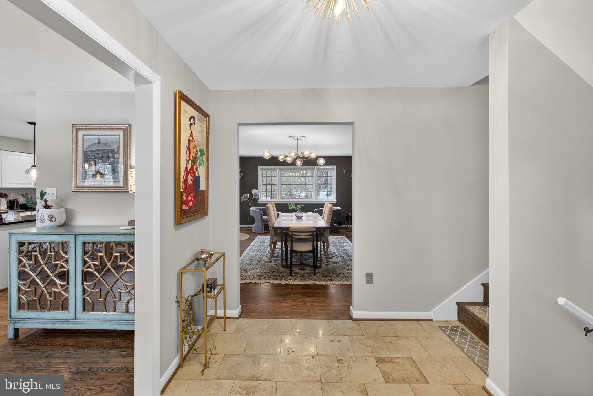 2849 Hideaway Road Fairfax, VA 22031 - Photo 10 of 45 a view of a hallway with wooden floor and a livingroom