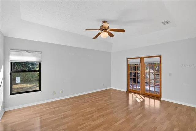 a living room with furniture a window and a fireplace